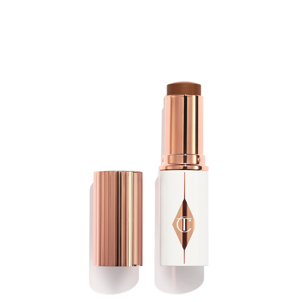 Charlotte Tilbury Unreal Skin Tint & Sheer Glow Hydrating Foundation Stick - Cream Foundation Makeup with Sheer-to-Light Coverage & a Buildable Formula - Blurring, Smoothing & Nourishing