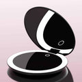 Fancii Taylor LED Lighted Travel Makeup Mirror, Rechargeable with 10x/1x Magnifying & 3 Light Settings - Compact, Portable, Large 5” Wide Hand Mirror for Handbag and Purses (Black)