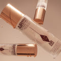 Charlotte Tilbury Airbrush Flawless Setting Spray - Ultra-Fine Hydrating Mist to Prime & Set Makeup Up to 16Hr – Soothes and Blurs Skin, Waterproof, Wedding Makeup