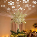 Brightown 12" Gold Christmas Star Tree Topper, Rotating Snowflake Projector